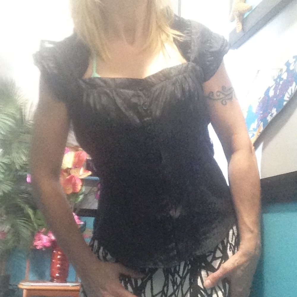 Button up black ruffled blouse